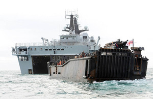 HMS Bulwark and one of her landing craft