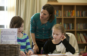 Teacher talking to students