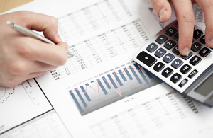 Pupil using a calculator