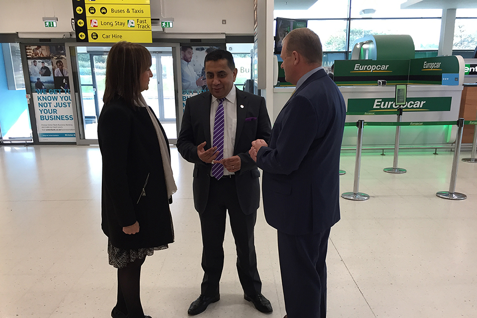 Lord Ahmad meeting officials from Belfast City airport.