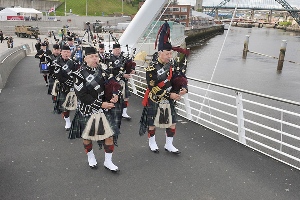 A Band of Pipers leading the way at the start of the march in Gateshead