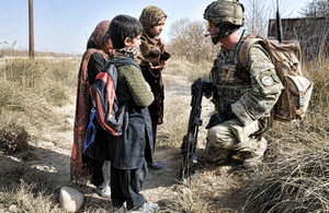 Afghan children alert Corporal Martin