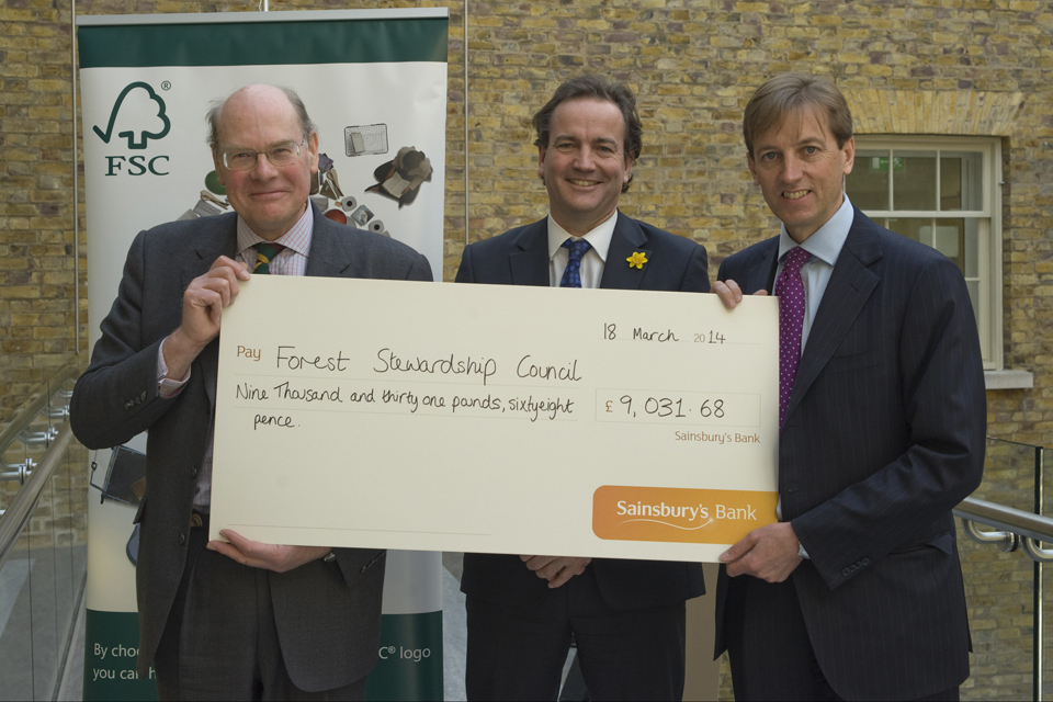 Civil Society Minister presents recycling scheme  proceeds to forests charity