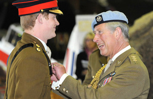 Lieutenant Wales is given his flying wings by his father The Prince of Wales