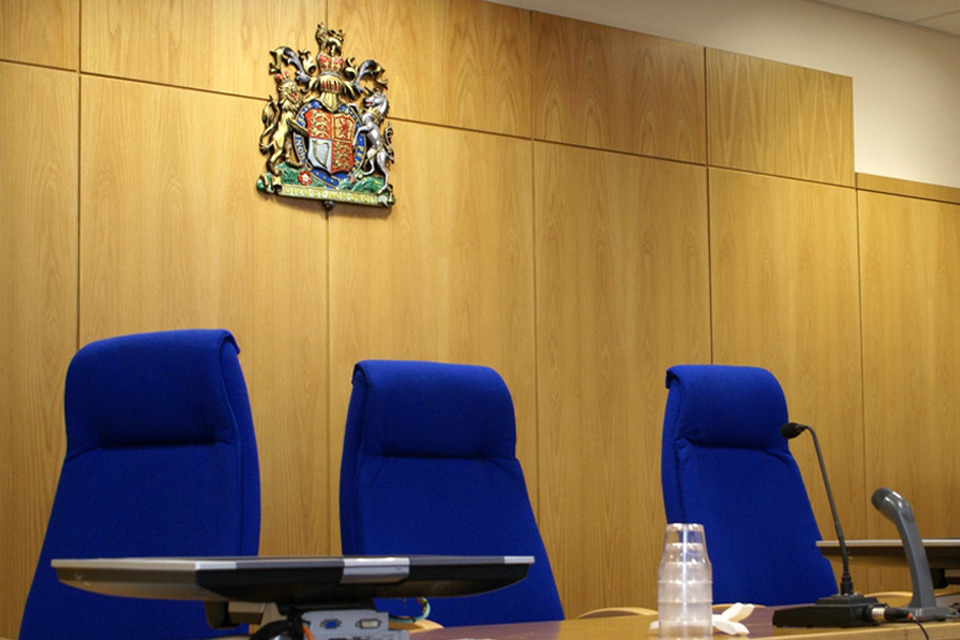Juror jailed for discussing trial with defendants