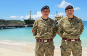 WO2 Carl Green & Maj Andy Nixon MBE in front of the jetty at Road Bay, Anguilla