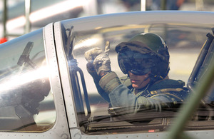 A Tornado GR4 pilot signals to ground crew before deploying on a mission over Libya (stock image).