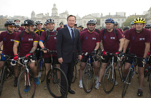 David Cameron supporting Grenadier Guardsmen on charity cycle ride