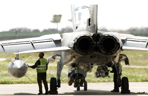A member of Royal Air Force ground crew checks a Tornado aircraft at Gioia del Colle air base in southern Italy