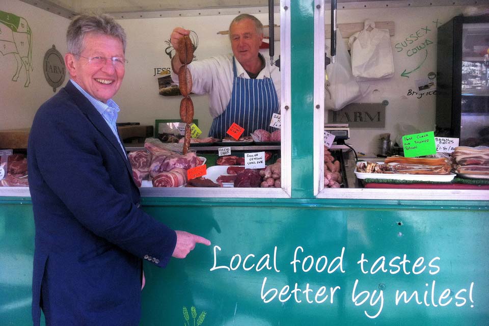 Don Foster at a butcher's stall