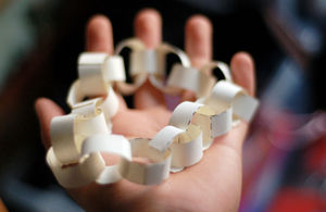 Paper chain in child's hand