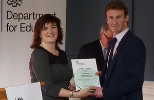 George Hunter receives his award from Secretary of State for Education Nicky Morgan