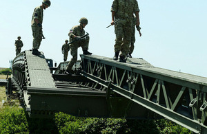 British airborne engineers deploying a 100-foot Medium Girder Bridge [Picture: Corporal Obi Igbo, Crown copyright]