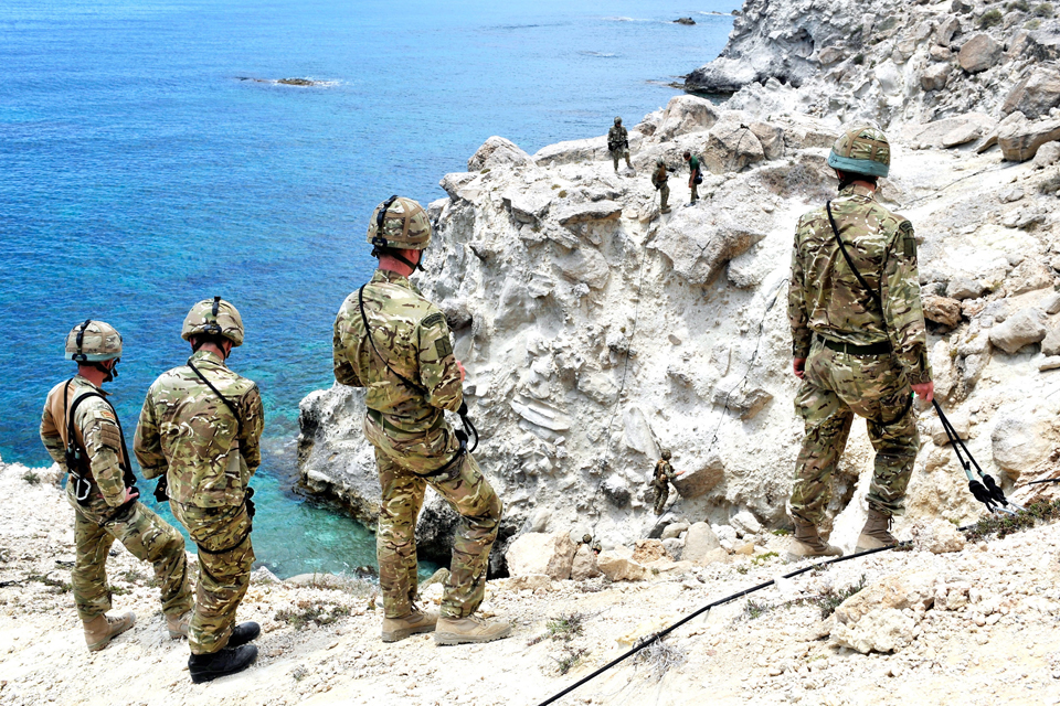 A company of Royal Marines conducts vertical assault training