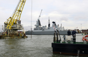 Today, 14th December 2015, Secretary of State Rt Hon Michael Fallon visited the dredging site at HMNB Portsmouth where the new Queen Elizabeth aircraft carrier will be berthed. Image: L(Phot) Nobby Hall