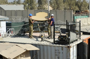 RAF personnel dismantle Reacher satellite equipment at Kandahar airfield [Picture: Sergeant Ross Tilly RAF, Crown copyright]