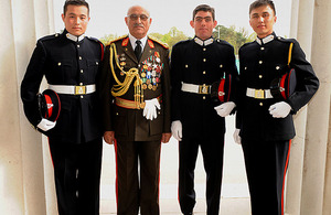 Left to right: Officer Cadet (OCdt) Soliman Khaleghy, General Sher Mohammad Karimi, OCdt Noor Rahimi, and OCdt Mahmood Yaqubi