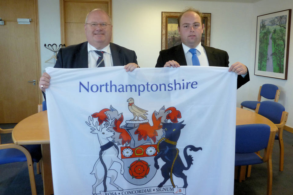 Presenting the Northamptonshire flag to the Secretary of State