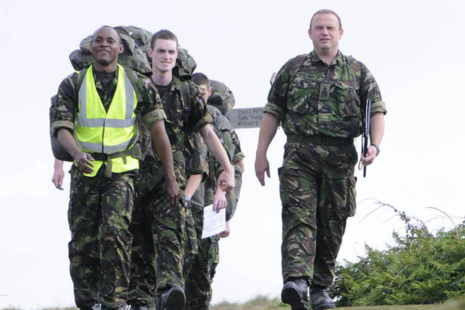 Able Seaman Fasuba at the head of his group completing a walk around the Rame Peninsular during his 10-week initial naval training course  