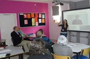 Charge’ D’Affaires Simon Mustard attends a sign language class during the Diversity Week