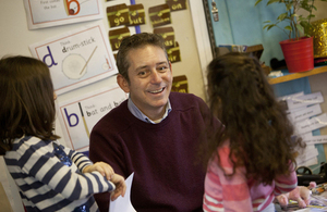 Teacher talking to children