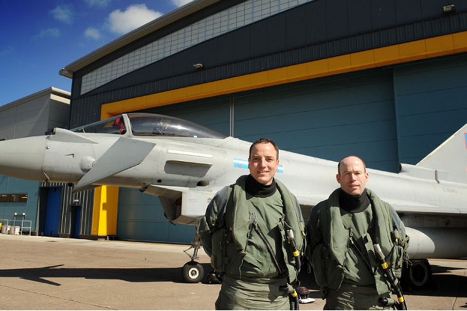 Squadron Leader Matt Peterson (right) and Wing Commander Roddy Dennis with an RAF Typhoon