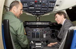 Wing Commander Jon Beck, Officer Commanding 32 (The Royal) Squadron, shows Philip Dunne, Minister for Defence Equipment, Support and Technology the cockpit of the new BAe 146 Mk3 aircraft [Picture: Senior Aircraftman Stewart Paterson, Crown copyright]
