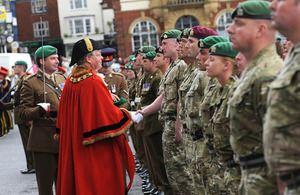 Soldiers from 4 Military Intelligence Battalion being inspected by the Mayor of Marlborough, Councillor Alexander Kirk Wilson, in the grounds of Marlborough College