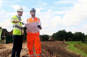 Image shows Chris Wosman and Ted Thomas on site at Lustrum Beck
