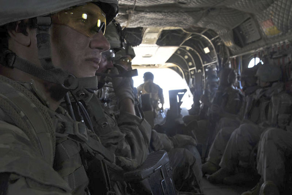 Members of 3 Commando Brigade Reconnaissance Force inside one of the Chinook helicopters used in the assault in Helmand province 