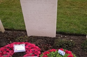 Wreaths laid by the headstone of Sergeant Frederick Evans, Crown Copyright, All rights reserved