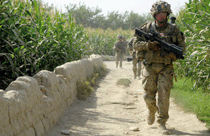 A soldier armed with an SA80 with underslung grenade launcher leads a patrol in Afghanistan [Picture: Sergeant Andy Reddy RLC, Crown copyright]