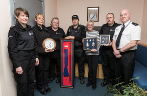 Pictured left to right: PC Gill Coghill, Sgt Jacqueline Mackay, Sgt Karen Tadd, Sgt Chris Donaghy, Mrs Williams-Blake, Sgt Paul Brown and Supt Martin O’Kane