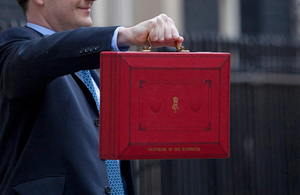 Chancellor holding the red Budget box