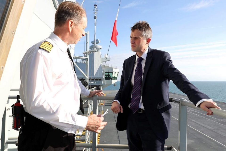 Defence Secretary Gavin Williamson meets Royal Navy Captain Jerry Kyd on board HMS Queen Elizabeth.