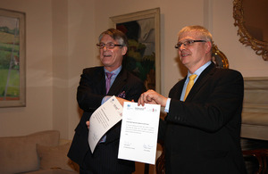 BPCC Chairman Antoni Reczek (left) and Ambassador Robin Barnett after having signed the memorandum