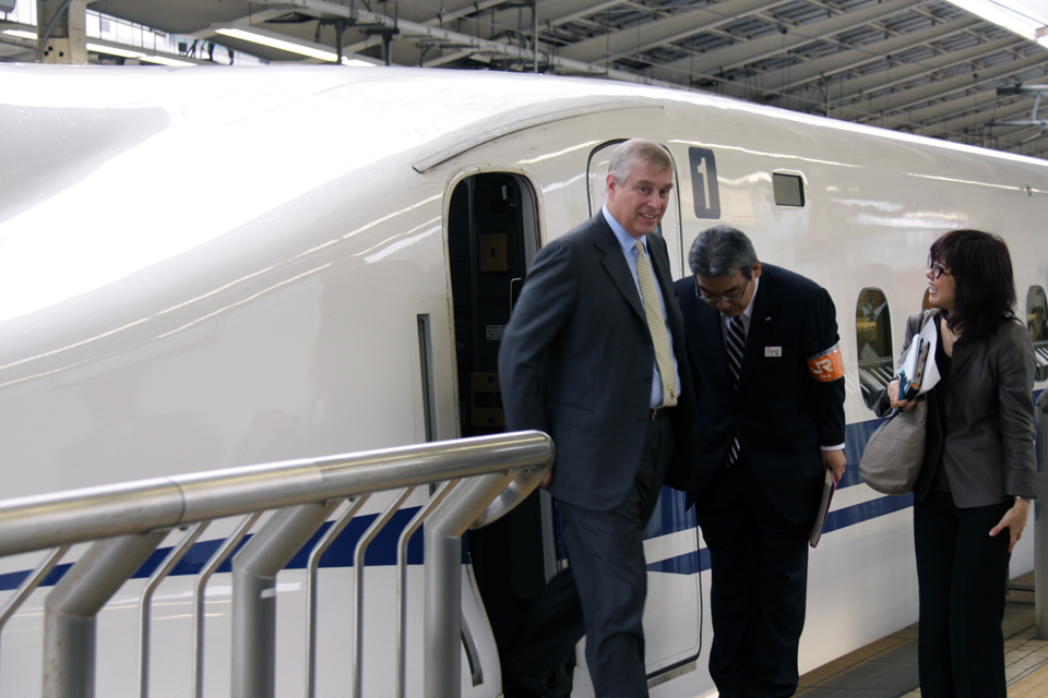 His Royal Highness The Duke of York exits the cockpit of a bullet train at JR Central's Tokyo Station