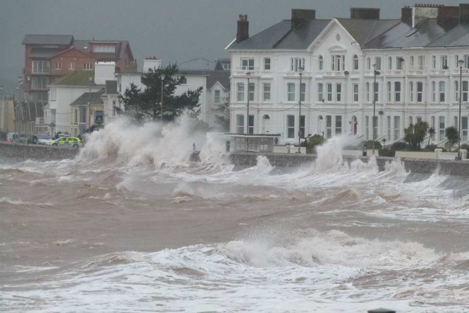 Wave lapping up against sea defences on Exmouth seafront in East Devon