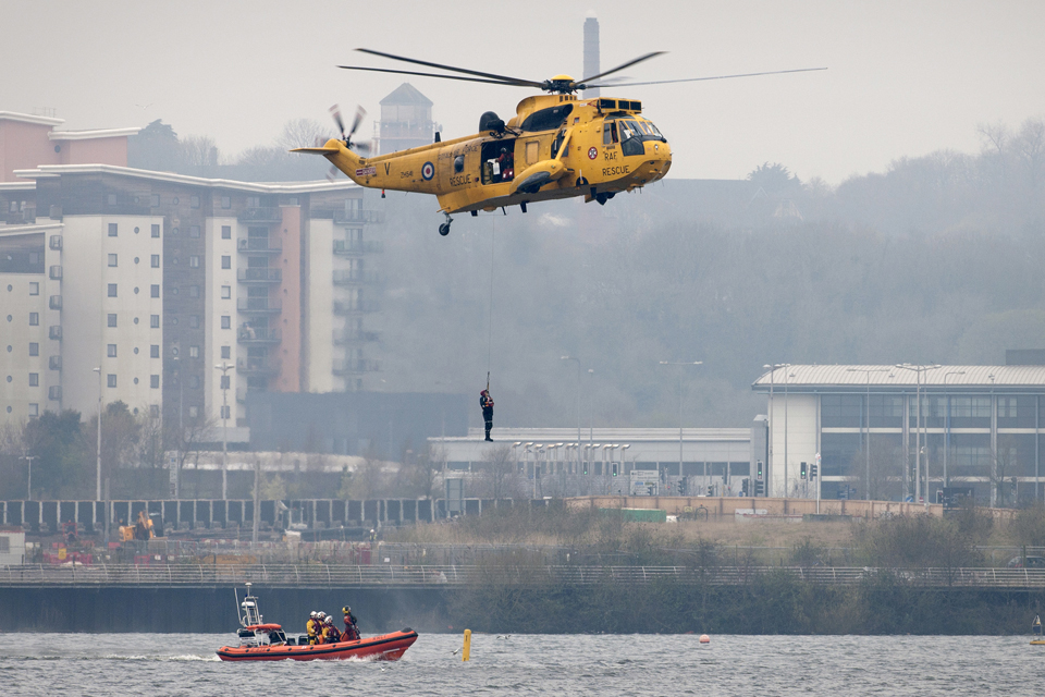 A member of the Hazardous Area Response Team being winched 