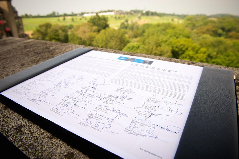 Armed Forces Declaration document with signatures from NATO heads of state and government.