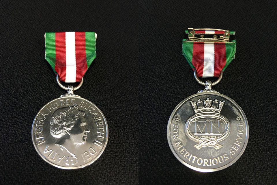 Image of the front and back of the Merchant Navy medal for meritorious service.