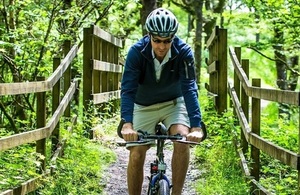 Male cycling in North Wales countryside