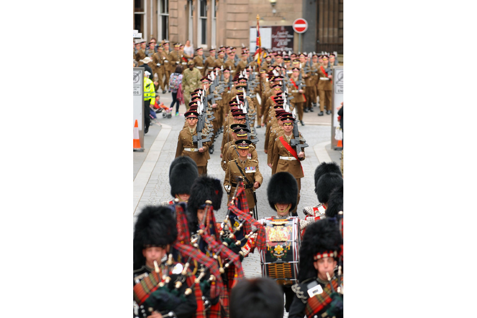 The 1st Battalion Scots Guards march through Inverness