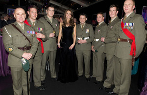 The Duchess of Cambridge with members of 42 Commando Royal Marines who received the award for Best Unit last year