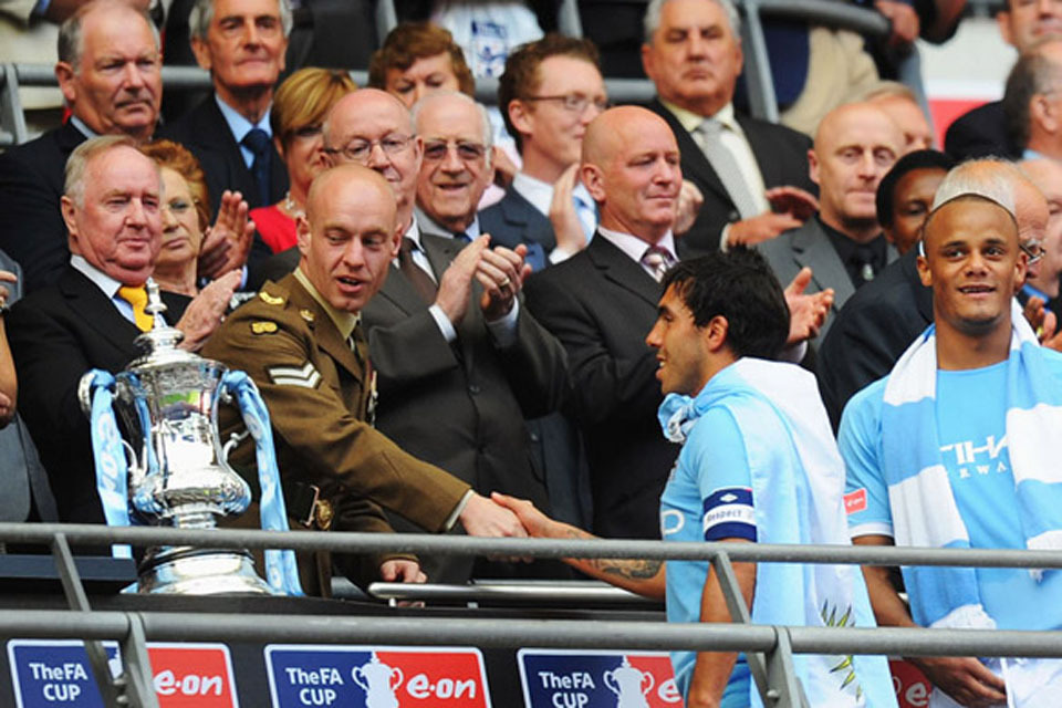 Soldier presents cup at FA final