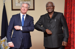 Defence Secretary Michael Fallon and His Excellency, President Ernst Bai Koromo, touch elbows for an ‘Ebola handshake’.