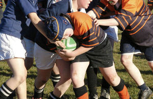 Boys playing rugby