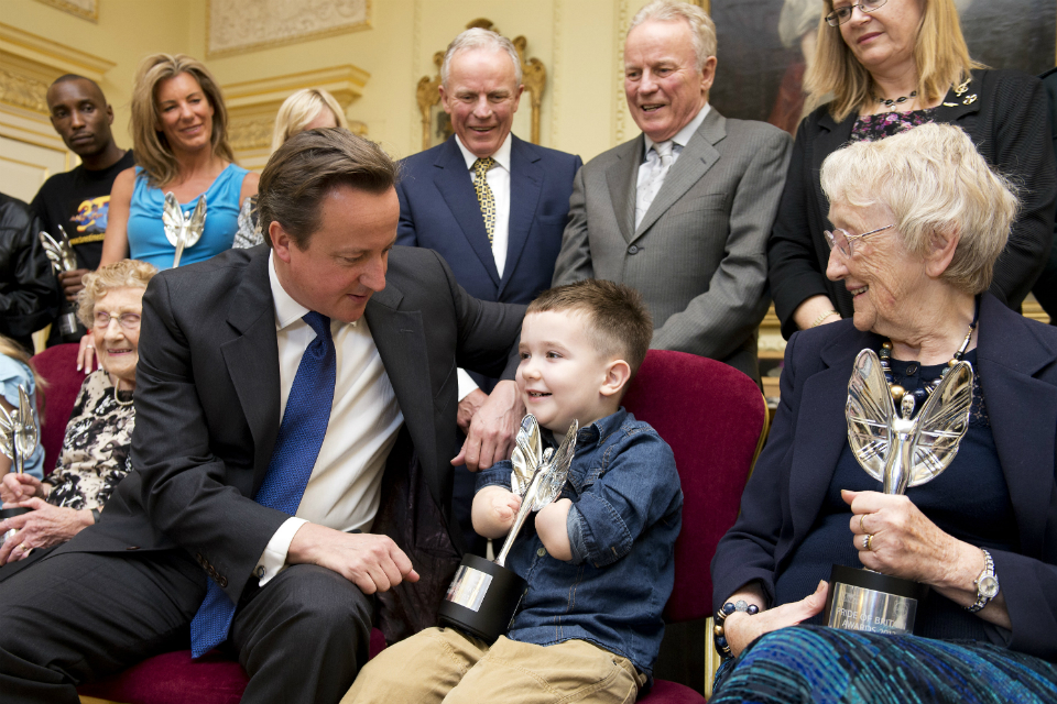 David Cameron with Pride of Britain Award winners 2013