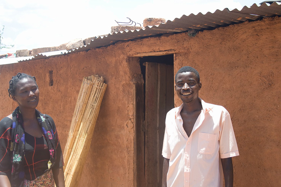 Enthric with Mwenzi’s husband Amon. Picture: International HIV/AIDS Alliance