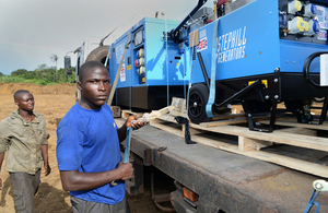 A convoy of vehicles loaded with generators and other supplies from DFID arrives at the Kerry Town Ebola treatment unit in Sierra Leone. Picture: Staff Sergeant Tom Robinson RLC Crown Copyright